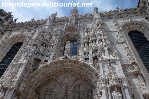 The intricate decorations above the doorway (south portal).