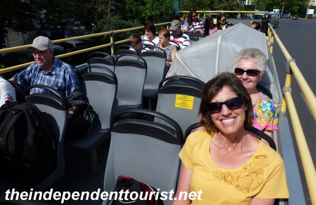 On the open-air hop on, hop off bus tour of Bucharest.