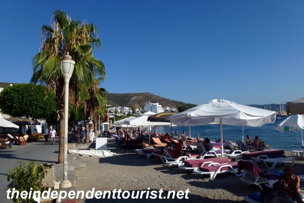 The beaches of Bodrum, right next to many restaurants and shops.
