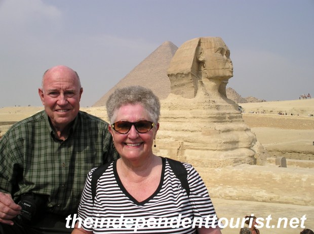 My in-laws at the Sphinx (Great Pyramid of Khufu in the background).