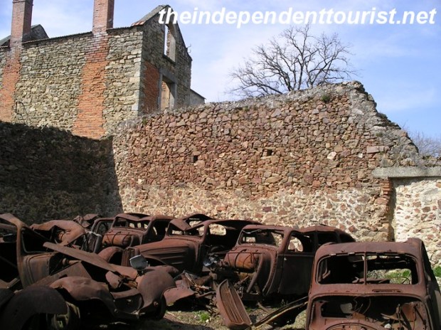 Remains of autos in a garage.