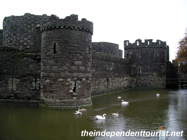 The exterior and moat of Beaumaris Castle.