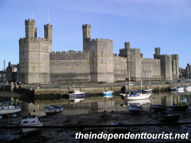 A view of Caernarfon Castle from across the River Seiont.