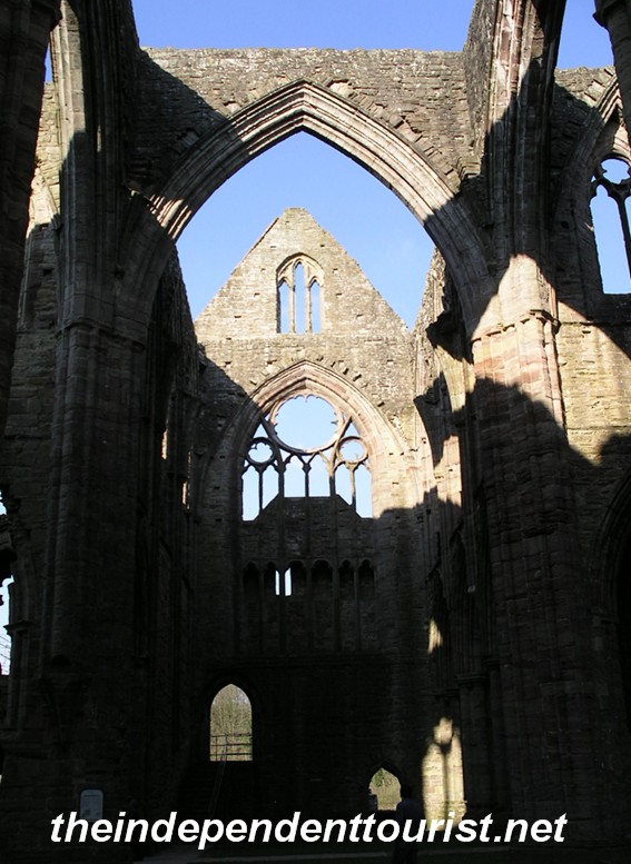 Another interior view of Tintern Abbey, note the fine window detail.