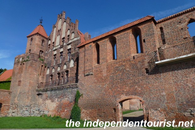 Toruń's city walls and the 15th century Burghers Hall, which was the home of the Brotherhood of St. George, whose membership comprised the elite of Toruń.