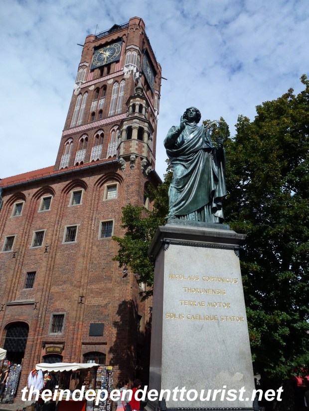 Statue of Copernicus and the Town Hall tower, which you can climb for great views.