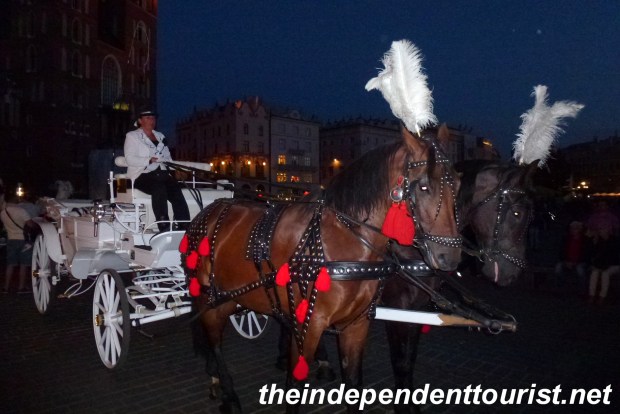 The stately horse carriages in Rynek Square.