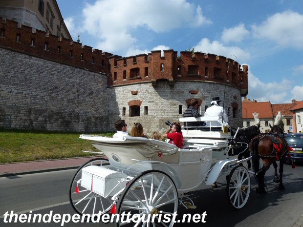 A great way to see Wawel Castle's exterior is by a carriage ride.