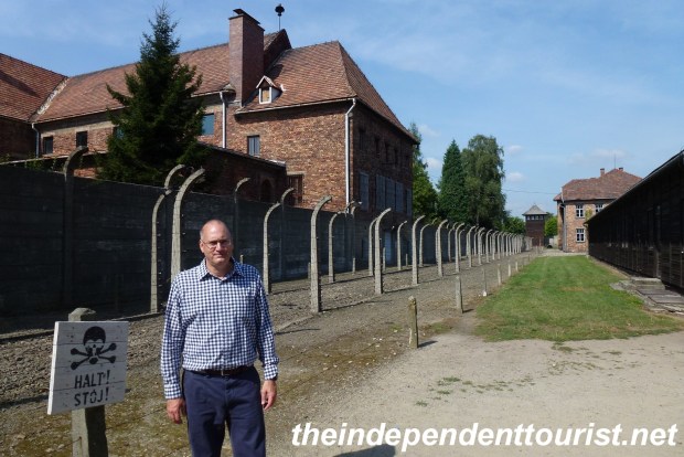 One of the fence lines at Auschwitz I. The building behind me was where the confiscated belongings of the prisoners were kept, along with the supplies of the poison gas.