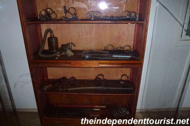 A display of various interrogation/torture devices.