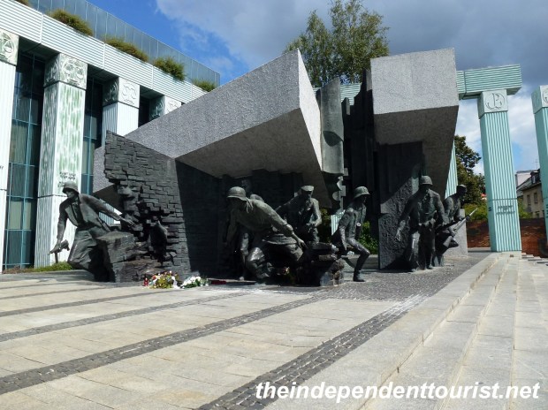 The bronze sculpture shows the Polish fighters emerging from the brickwork of their ruined city and descending into the city sewers, which were used as an underground communications system. It was unveiled on August 1, 1989, 45 years after the uprising.