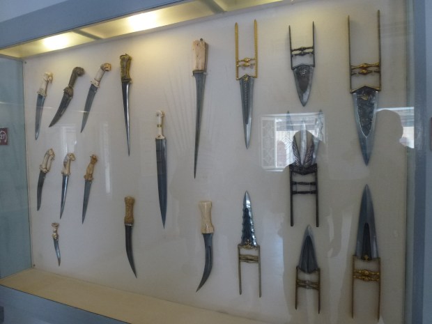 Display of daggers and other formidable weapons.